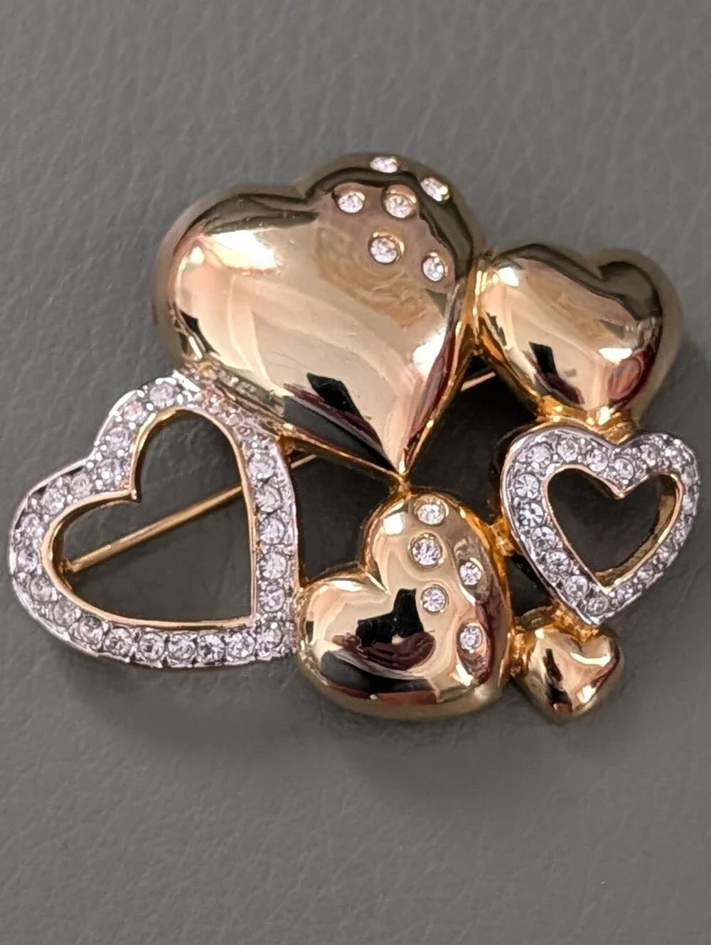 Vintage 3D Gold Tone Heart Cluster Brooch Adorned With Clear Rhinestones